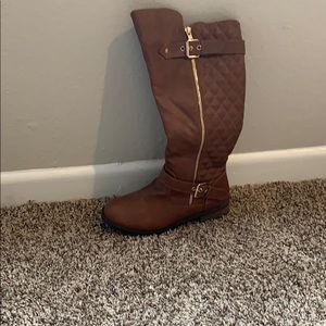 Brown riding boots